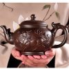 The Spirit of the Dragon and Horse Brown Yixing Clay Teapot with Dragon Spout Strainer