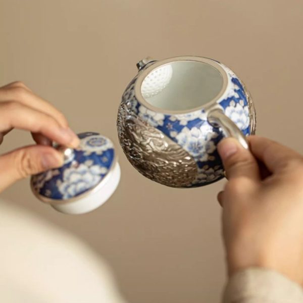 Vintage Ceramic Teapot With Blue And White Relief Pattern Featuring Silver Dragon And Phoenix