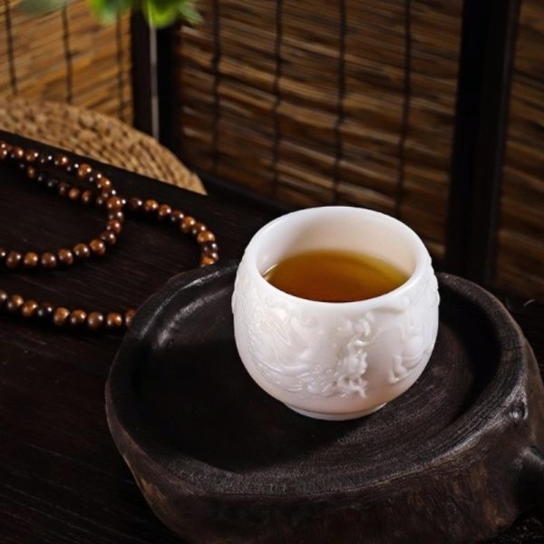 High-transmittance Ice Jade Porcelain Kung Fu Tea Cup with Embossed Flying Dragon