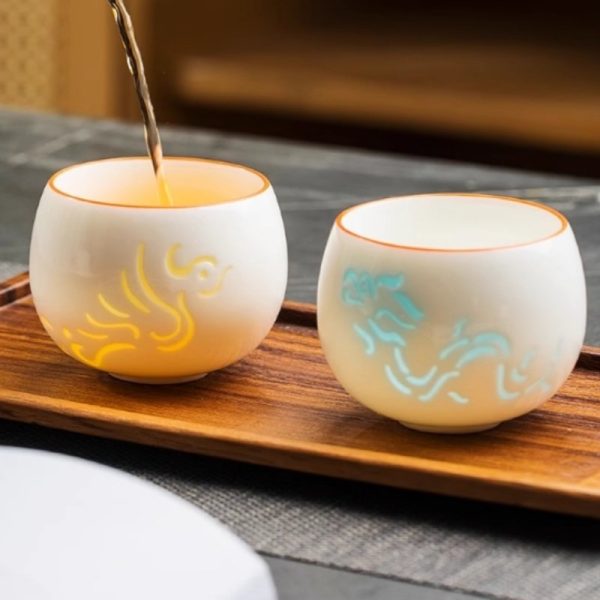 Traditional White Ceramic Hollow Carving Simplified Chinese Dragon Gongfu Tea Cup