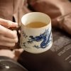 Exquisite Hand-Painted Blue and White Porcelain Auspicious Clouds Dragon Tea Cup Mug